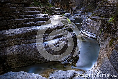 Calming Mountain Stream in Stones. Nature Relaxing Landscape. Torrent in natural landscape with waterfall, geological phenomenon Stock Photo