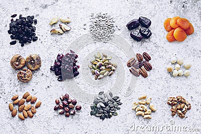 100 calories portion healthy snack of nuts, seeds and dried fruits Stock Photo