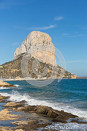 Calp Spain landmark rock blue sky and waves Stock Photo