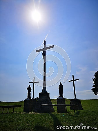 Calvary crosses and staues on top of hill Stock Photo