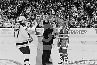 Cam Neely shakes hands with Mark Messier. Editorial Stock Photo