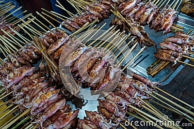 Cambodia. Kep. The crab market. Barbecue squid skewers Stock Photo