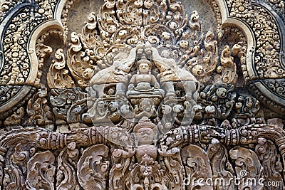 Cambodia. Siem Reap. Carved stone patterns on temple walls Banteay Srey Xth Century Stock Photo