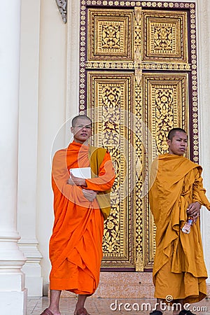 Cambodian Buddhist monks posing, King's palace, Phnom Penh. Editorial Stock Photo