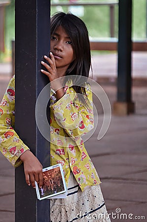 Cambodian child postcard seller Editorial Stock Photo