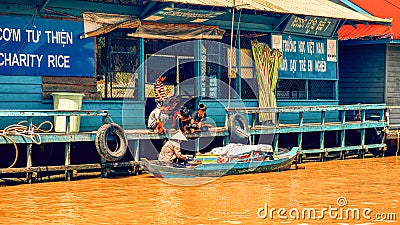 Cambodian food seller on the Tonle Sap lake Editorial Stock Photo