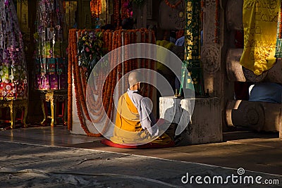 Bodh gaya bihar india on april 29th 2018: cambodian monk praying at Mahabodhi temple complex in bodhgaya, India. the mahabodhi Vih Editorial Stock Photo