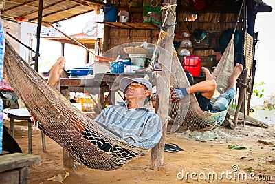 Cambodian people live beside Tonle Sap Lake in Siem Reap Editorial Stock Photo