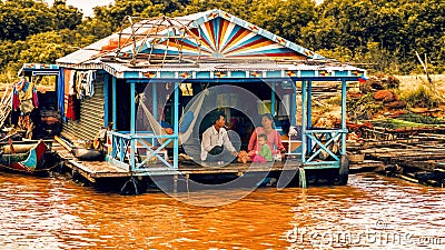 Cambodian people live on Tonle Sap Lake in Siem Reap, Cambodia. Unidentified people in a Floating village on the Tonle Sap Lake Editorial Stock Photo