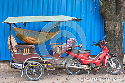 Cambodian tuktuk driver sleeps Editorial Stock Photo