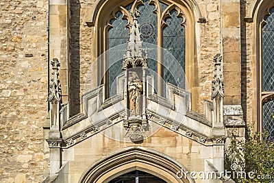 Detail view at the ornamented statue on the exterior facade at the Great St Mary`s Church Stock Photo