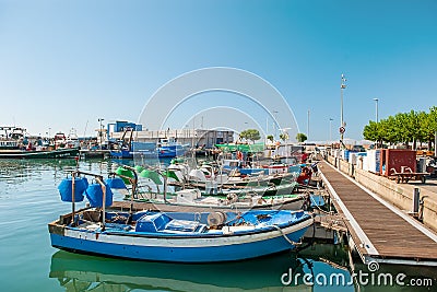 Cambrils Spain-August 8 2013. Boats and fishing nets and tackle lie in wait for fishing. Small business Europe. Tourist places of Editorial Stock Photo