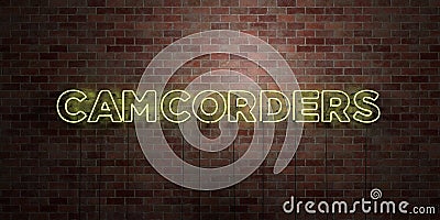 CAMCORDERS - fluorescent Neon tube Sign on brickwork - Front view - 3D rendered royalty free stock picture Stock Photo