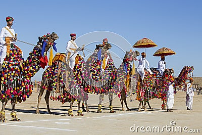 Camel and indian men wearing traditional Rajasthani dress participate in Mr. Desert contest as part of Desert Festival in Jaisalme Editorial Stock Photo