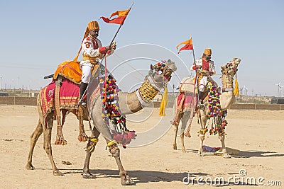 Camel and indian men wearing traditional Rajasthani dress participate in Mr. Desert contest as part of Desert Festival in Jaisalme Editorial Stock Photo