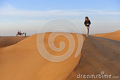 Camel ride in the desert Stock Photo