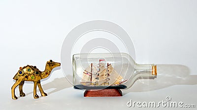 Camel after sailing ship collage Stock Photo