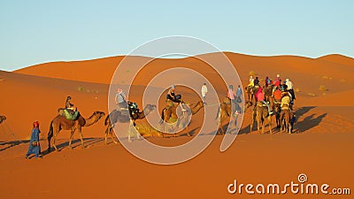Camel tourist caravan in desert Editorial Stock Photo