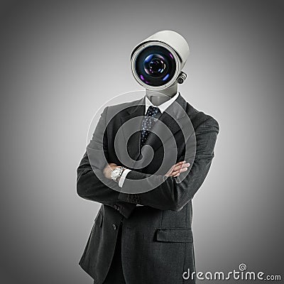 Camera headed man on grey background Stock Photo