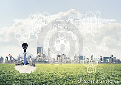 Camera headed man sitting in lotus pose on cloud against modern Stock Photo