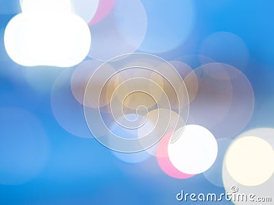 Camera lens bokeh effect on blue background Stock Photo