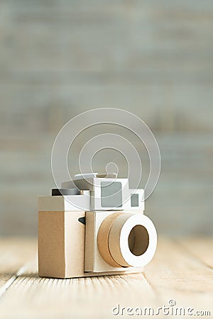 Camera paper on the wood background Stock Photo