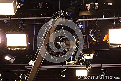 Camera record on crane in production on studio and light to stag Stock Photo