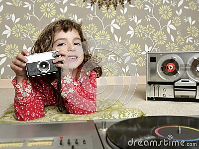 Camera retro photo little girl in vintage room Stock Photo