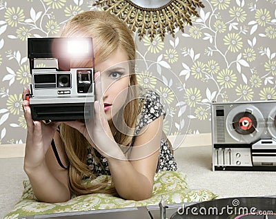 Camera retro photo woman in vintage room Stock Photo