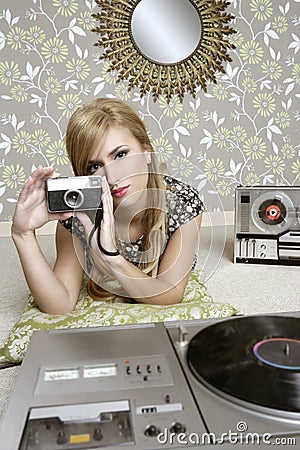 Camera retro photo woman in vintage room Stock Photo