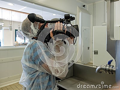 Cameraman with digital cinema camera Editorial Stock Photo