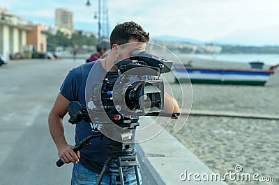 Cameraman with digital cinema camera Editorial Stock Photo