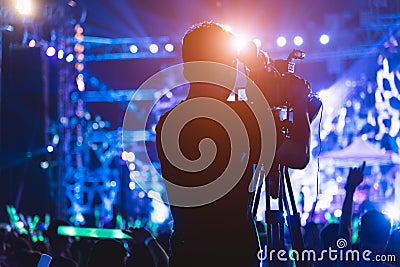 Cameraman shooting video production camera videographer Editorial Stock Photo