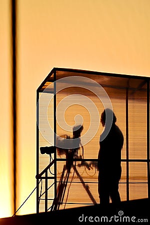 Cameraman silhouette at sunset Stock Photo