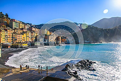 Camogli - People relaxing on the beach at the Mediterranean Sea Editorial Stock Photo