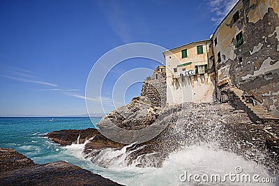 Camogli, Italy - spectacular view of the rocky coast and ancient Editorial Stock Photo