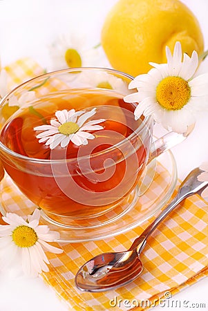 Camomile tea in glass Stock Photo