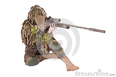 Camouflaged sniper in ghillie suit Stock Photo