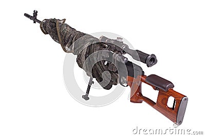 Camouflaged sniper rifle Stock Photo