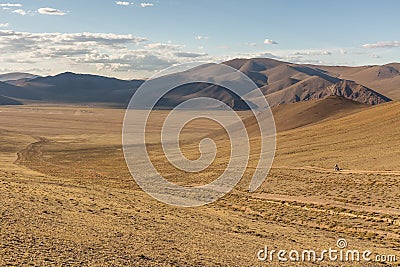 Camp of yurt , in the grassland of Mongolia, Mongolian nomad on a motorcycle Stock Photo