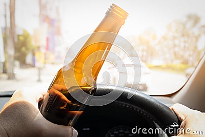 Campaign against drunk driving,get home safely or travel safe,safety on street,Don't drink and drive, man driver drinking Stock Photo