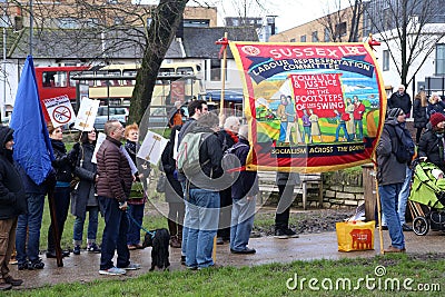 Campaigners march through Brighton, UK in protest against the planned cuts to public sector services. The march was organised by B Editorial Stock Photo