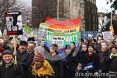 Campaigners march through Brighton, UK in protest against the planned cuts to public sector services. The march was organised by B Editorial Stock Photo