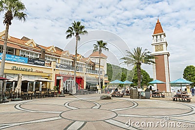Campanile and restaurant in outdoor shopping mall in Discovery Bay, Hong Kong Editorial Stock Photo