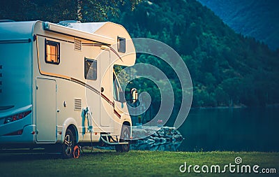 Camper Camping at the Lake Stock Photo