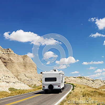 Camper on scenic road. Stock Photo