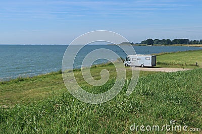 Camper van at lakeside Editorial Stock Photo