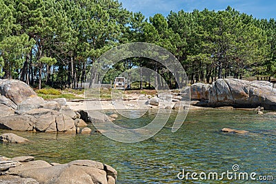 Camper van living van life in a wild beach of Arousa island in Galicia, Spain Stock Photo