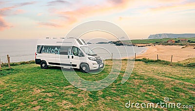 Camper van parked next to beach at summer Editorial Stock Photo