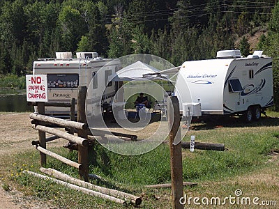 Campers disobeying a sign in idaho Editorial Stock Photo